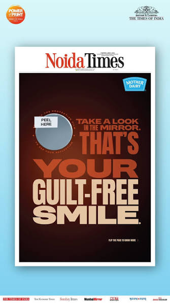 Mother Dairy Go-Low Ice Cream front-page newspaper ad with a peelable mirror